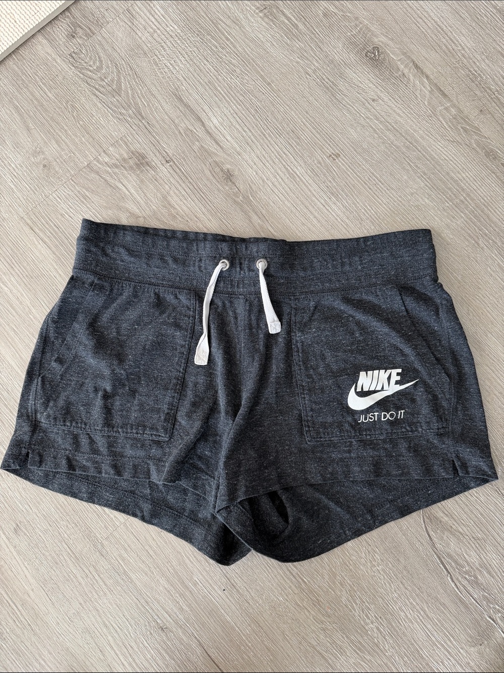Nike Women's Charcoal Knit Athletic Shorts with White Logo